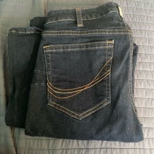 Women’s dark wash ariat flare jeans.